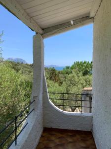 a view from the balcony of a house at Casa Le Cicale in Porto Istana