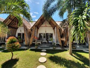Gallery image of Palm Green Hotel in Kuta Lombok
