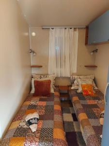 Кровать или кровати в номере Camp Maslina