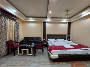Postel nebo postele na pokoji v ubytování Mohana Beach Resorts Mandarmani
