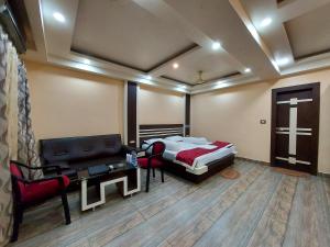 Postel nebo postele na pokoji v ubytování Mohana Beach Resorts Mandarmani