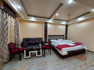 Postel nebo postele na pokoji v ubytování Mohana Beach Resorts Mandarmani