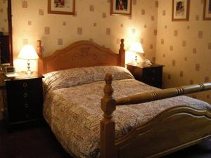 Un ou plusieurs lits dans un hébergement de l'établissement Buckingham Hotel