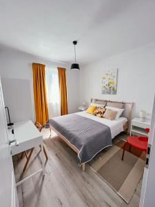 Postel nebo postele na pokoji v ubytování Apartments Happy