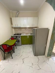 Kuchyň nebo kuchyňský kout v ubytování SARPI HOTEL NUMA
