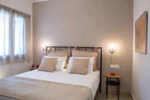 Postel nebo postele na pokoji v ubytování Edward Art Boutique Hotel