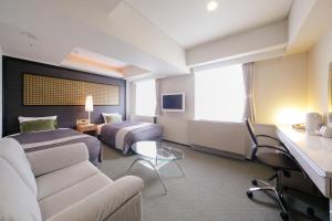 TV a/nebo společenská místnost v ubytování Grand Park Hotel EX Fukushimaebisu
