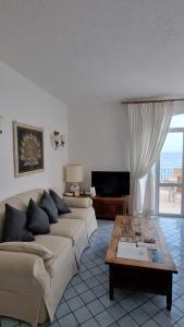 Posezení v ubytování Hotel Punta Rossa