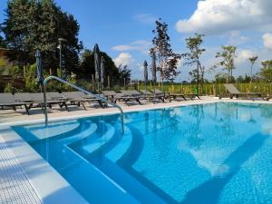The swimming pool at or close to Garda Di Vino Agricamping & Wine Shop Lazise