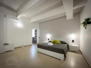 Postel nebo postele na pokoji v ubytování Matera nel verde + 28 fotografií
