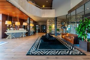Uma área de estar em Hotel Antonio II