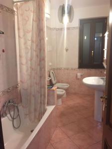 Kúpeľňa v ubytovaní CASA VACANZE AMBRA