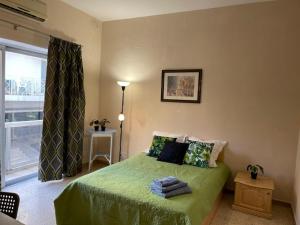 Кровать или кровати в номере Olivier House Mellieha