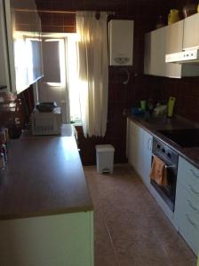 Kuchnia lub aneks kuchenny w obiekcie Casa Garome 14 PARKING GRATIS