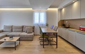 Гостиная зона в Apartments Amare