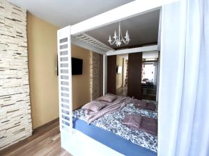 Posteľ alebo postele v izbe v ubytovaní Comfort Apartment 2 rooms 65m2