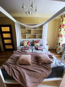 Posteľ alebo postele v izbe v ubytovaní Comfort Apartment 2 rooms 65m2