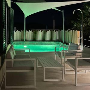 The swimming pool at or close to THE AA VILLA: Your Interactive Home Experience!