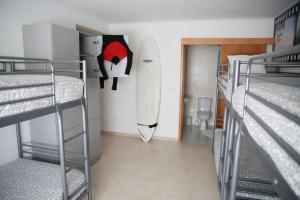 Postel nebo postele na pokoji v ubytování Zambeachouse - Hostel Paradise
