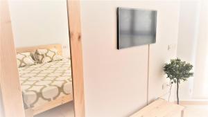 Postel nebo postele na pokoji v ubytování BEACH VALENCIA LUXURY - B40-21 - Apartament on Beach