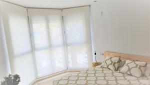 Postel nebo postele na pokoji v ubytování BEACH VALENCIA LUXURY - B40-21 - Apartament on Beach