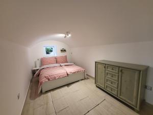 Postel nebo postele na pokoji v ubytování Apartmány u Koláčků