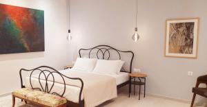 Postel nebo postele na pokoji v ubytování Edward Art Boutique Hotel