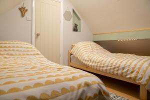 Katil atau katil-katil dalam bilik di The Fern at BrackenXcapes