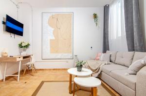 TV a/nebo společenská místnost v ubytování Luxury Townhouse with panoramic sea view
