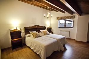 Postel nebo postele na pokoji v ubytování Posada Real del Buen Camino