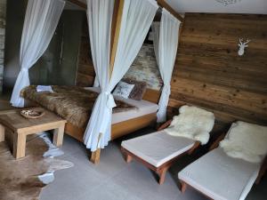 Postel nebo postele na pokoji v ubytování Chalet Rebeca 12 beds Donovaly