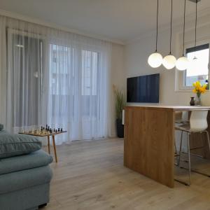 Televízia a/alebo spoločenská miestnosť v ubytovaní Villa Maboka