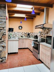 Virtuvė arba virtuvėlė apgyvendinimo įstaigoje Casa Flores