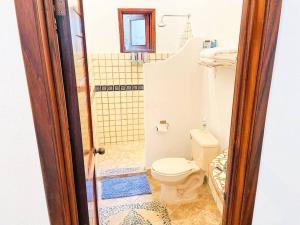 Ванная комната в Casa Boho 2