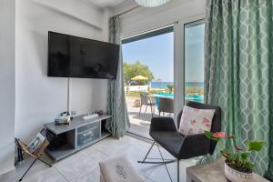 Μια τηλεόραση ή/και κέντρο ψυχαγωγίας στο Vrachos holiday home