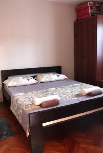 מיטה או מיטות בחדר ב-Holiday Home Gazevic