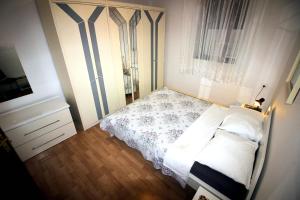 Postel nebo postele na pokoji v ubytování Apartment Leana Selce