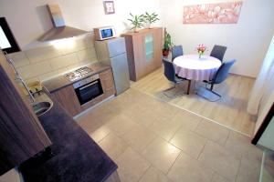 Kuchyň nebo kuchyňský kout v ubytování Apartment Leana Selce