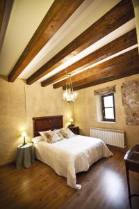 Postel nebo postele na pokoji v ubytování Posada Real del Buen Camino