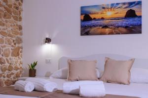 Postel nebo postele na pokoji v ubytování Miramare rooms b&b