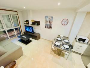 TV a/nebo společenská místnost v ubytování Apartamento TIERRA