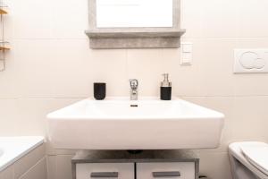 Łazienka w obiekcie Deluxe apartment near hauptbahnhof