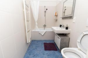 Łazienka w obiekcie Deluxe apartment near hauptbahnhof