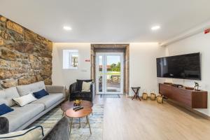 Et tv og/eller underholdning på O CERVO CHARM HOUSE