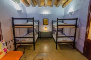 Postel nebo postele na pokoji v ubytování Casa Cordoba Román