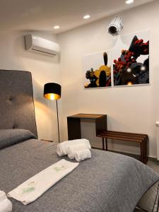 A bed or beds in a room at Welcome Catania
