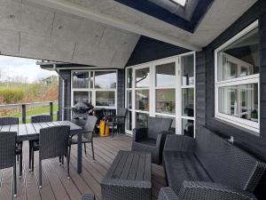 Balkón nebo terasa v ubytování 8 person holiday home in Roslev-By Traum