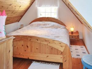 Säng eller sängar i ett rum på Holiday home HÖLLVIKEN III