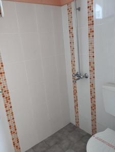 Koupelna v ubytování Zafo Hotel
