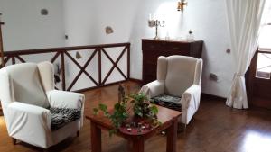 Area tempat duduk di Villa Rural Gloria´s